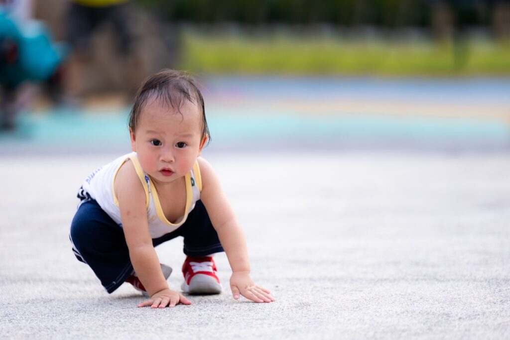 Baby favoring one side while crawling