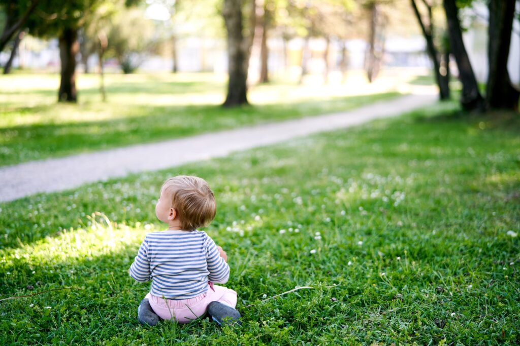 baby on grass at the park