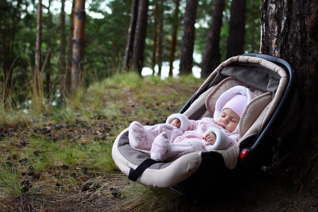 baby sleeping in car seat.