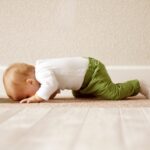 Baby resting with head down during tummy time